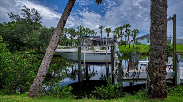 dock area featuring a water view and boat lift