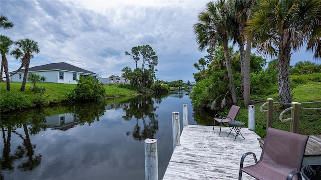 dock area featuring a water view