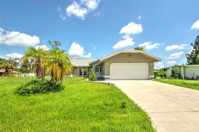 ranch-style house featuring a garage and a front yard