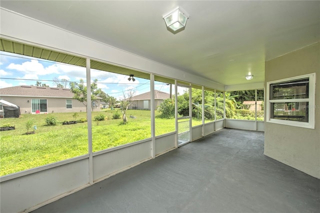 unfurnished sunroom featuring plenty of natural light