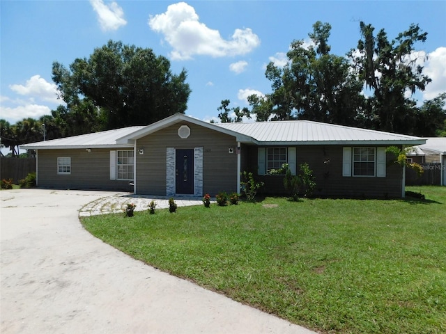 ranch-style house with a front yard