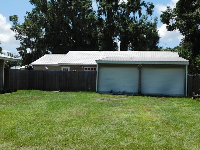 garage with a yard