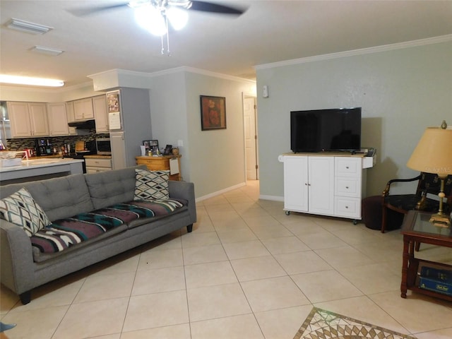 living room featuring ceiling fan, crown molding, and light tile patterned floors