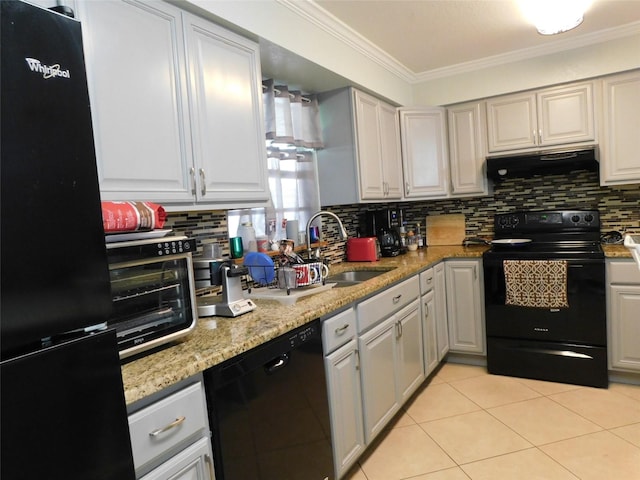 kitchen featuring sink, extractor fan, tasteful backsplash, crown molding, and black appliances