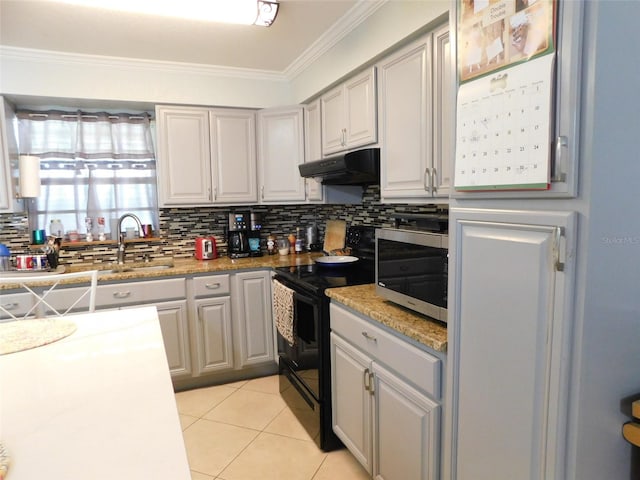 kitchen featuring black electric range, tasteful backsplash, crown molding, gray cabinetry, and light tile patterned flooring