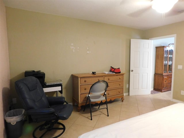 office with ceiling fan and light tile patterned flooring