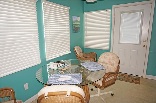 interior space featuring baseboards