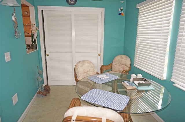 dining area featuring tile patterned flooring