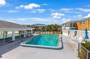 view of swimming pool with a patio