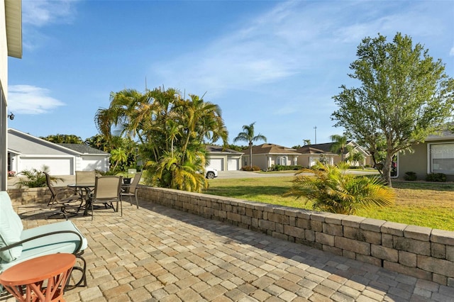 view of patio / terrace with a garage