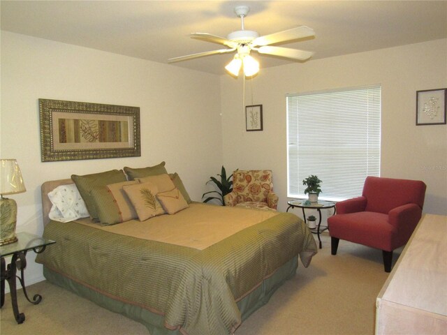 bedroom featuring ceiling fan and carpet flooring