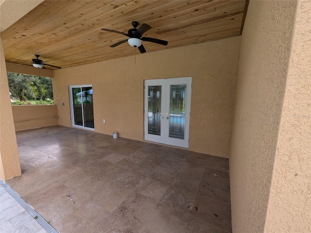 view of patio / terrace with french doors and a ceiling fan