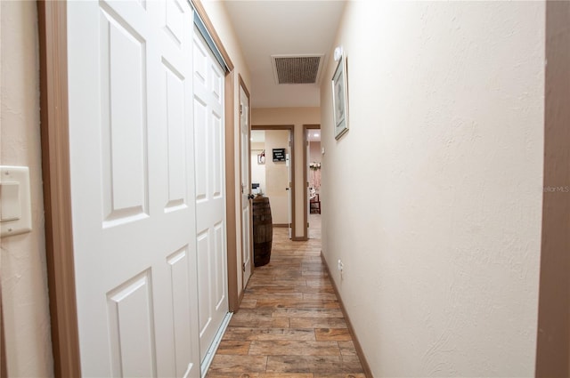 hall featuring wood-type flooring