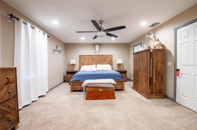 carpeted bedroom featuring ceiling fan