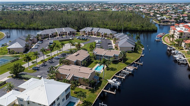 drone / aerial view with a water view