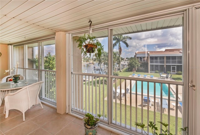 sunroom / solarium with a wealth of natural light