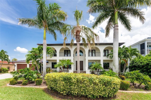 view of property with driveway