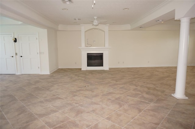 unfurnished living room featuring ornate columns, ceiling fan, a fireplace, and ornamental molding