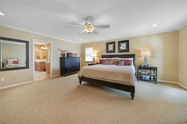 bedroom featuring baseboards, light colored carpet, ornamental molding, ensuite bathroom, and recessed lighting