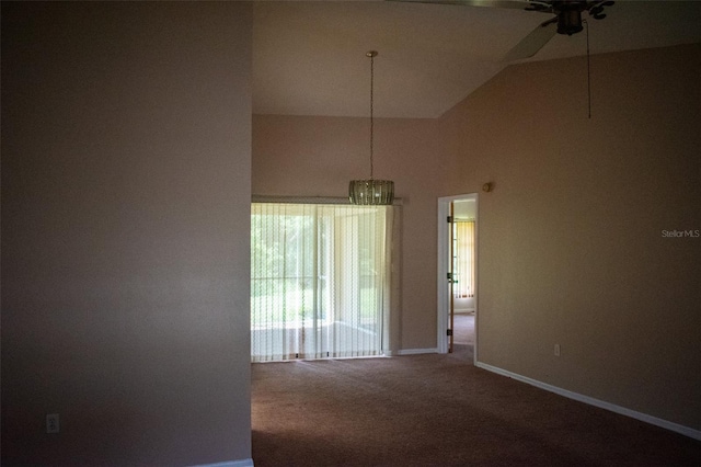 spare room featuring ceiling fan, carpet, and high vaulted ceiling