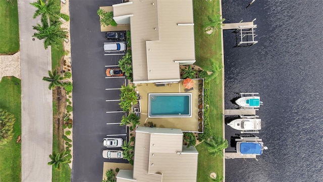 bird's eye view with a water view