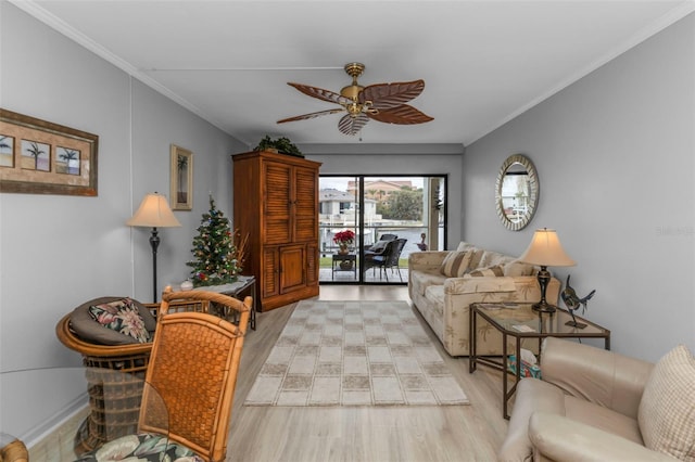 living room with ceiling fan, light hardwood / wood-style floors, and crown molding