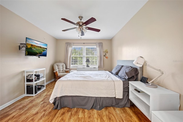 bedroom featuring ceiling fan and light wood-type flooring