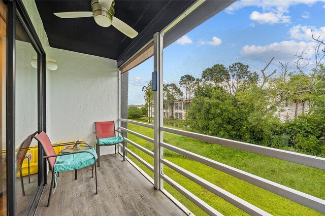 balcony featuring ceiling fan