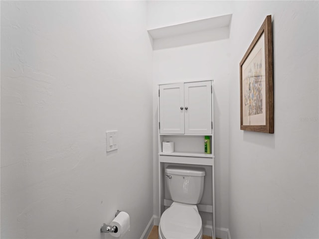 bathroom featuring toilet