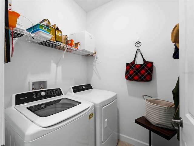 laundry area with laundry area and washer and clothes dryer