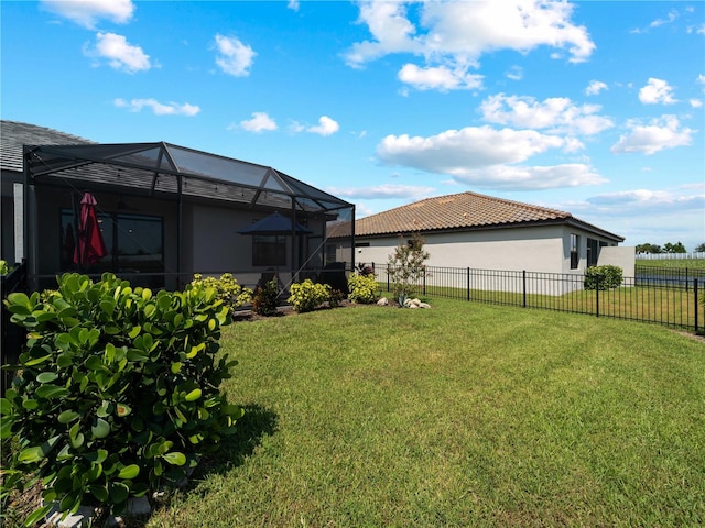 view of yard featuring a lanai