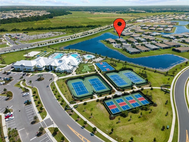 birds eye view of property featuring a water view