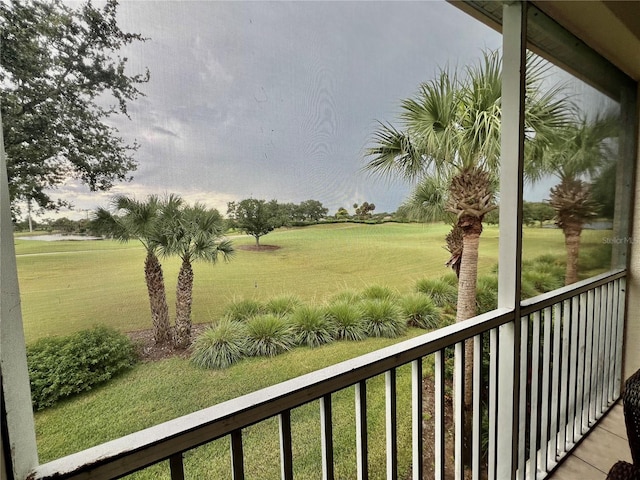 view of yard featuring a balcony