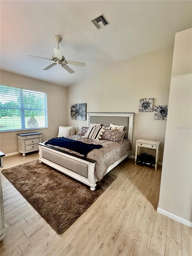 bedroom featuring light wood-type flooring and ceiling fan