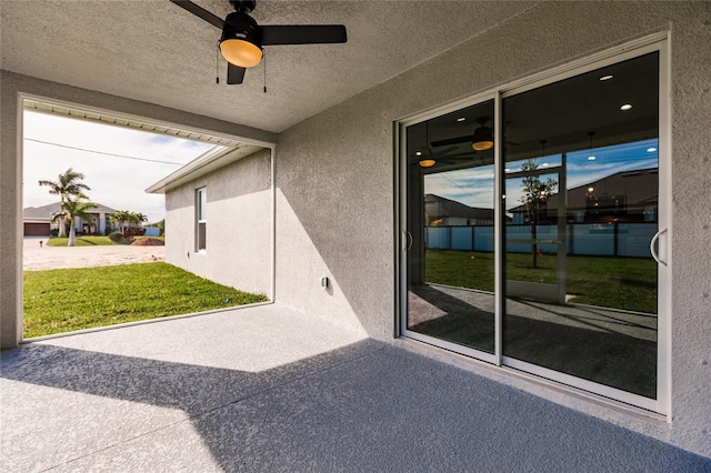 view of patio / terrace with a ceiling fan