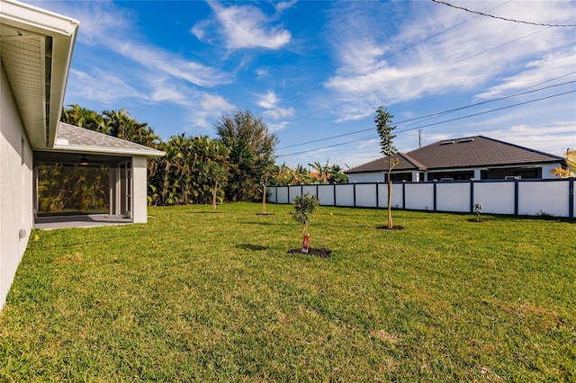 view of yard with fence