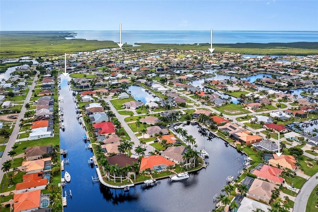 bird's eye view with a water view