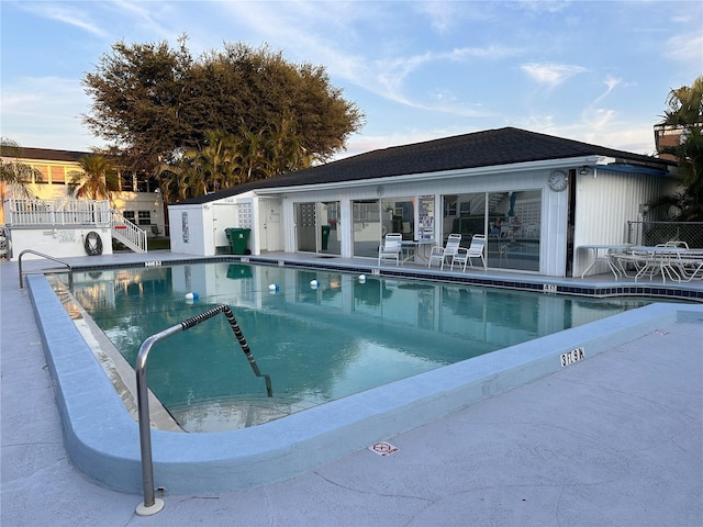 view of swimming pool featuring a patio