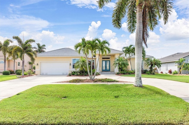 view of front of property featuring driveway, a front lawn, and stucco siding