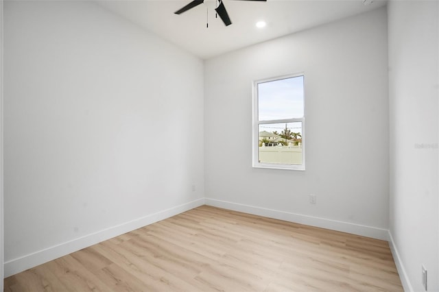 unfurnished room featuring ceiling fan and light hardwood / wood-style flooring