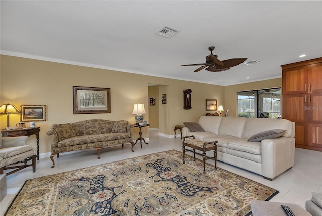 living room featuring crown molding and ceiling fan