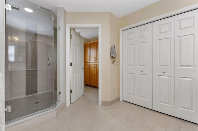 bathroom with an enclosed shower