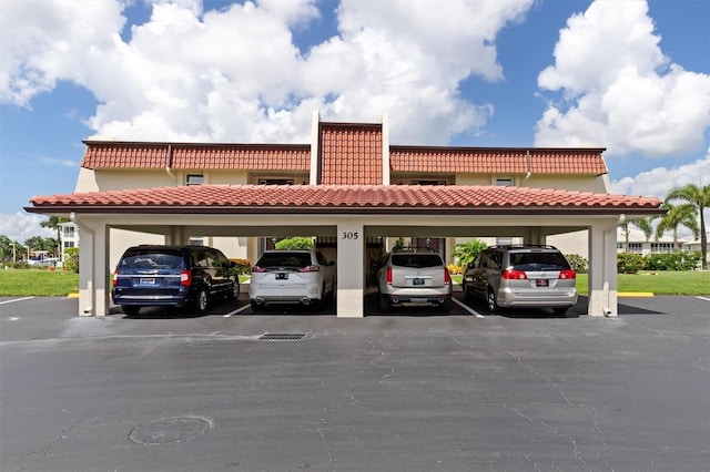 view of car parking with a carport