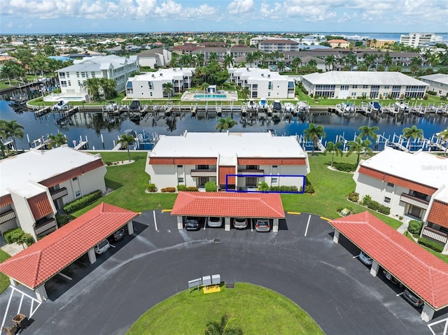 birds eye view of property featuring a water view