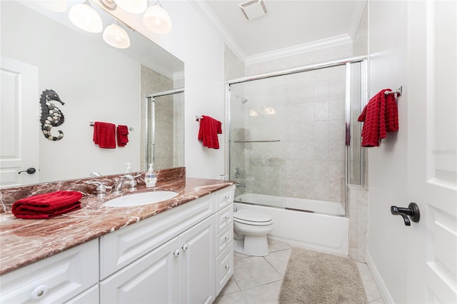 full bathroom with vanity, shower / bath combination with glass door, tile patterned floors, toilet, and ornamental molding