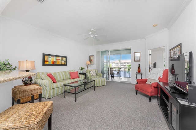 carpeted living room with ceiling fan and crown molding