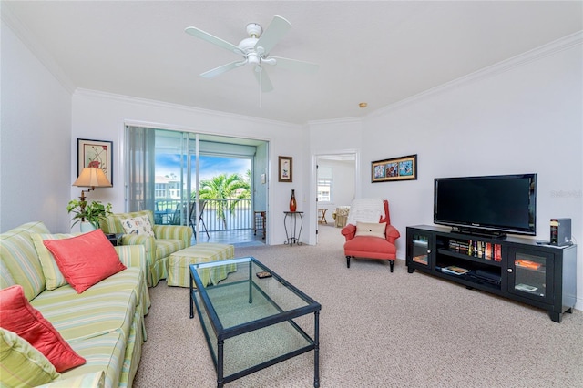 living room with ceiling fan, light colored carpet, and ornamental molding