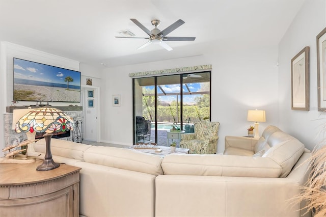 living room with ceiling fan