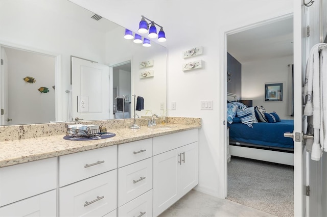 bathroom featuring vanity and tile patterned floors