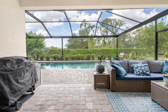 view of pool with a lanai and a patio area